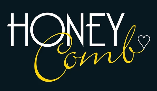 white and gold writing of Honey Comb hair salon in lYttelton