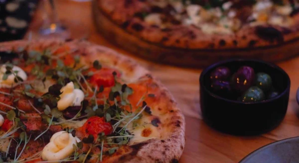 Pizza and bowl of Olives