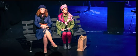 LAF people sitting on bench